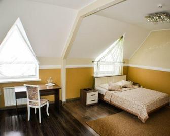 Guest House Gamma - Chanty-Mansijsk - Camera da letto