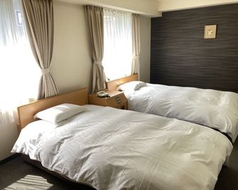 Hotel Shin Osaka - Osaka - Sypialnia