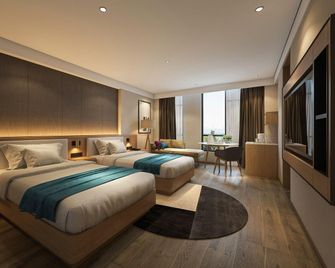 Zhengzhou Lucky Hotel - Čeng-čou - Ložnice