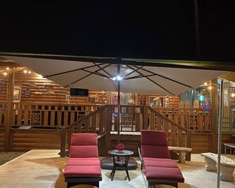 Poblado Cozy Log Cabin - Boqueron - Patio