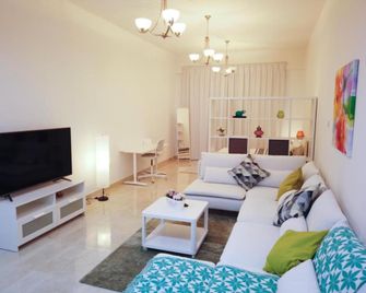 OYO 755 Home Sobha Greens - Dubái - Sala de estar