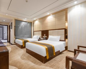 Jinhaitang Hotel - Baoshan - Slaapkamer