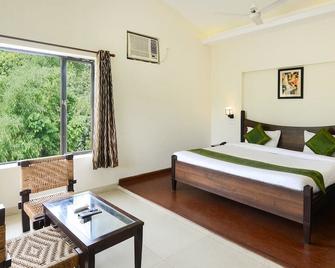 Treebo Aroma Park - Dhikuli - Bedroom
