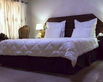 Mukuba Hotel - Ndola - Schlafzimmer