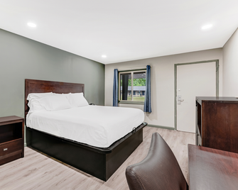 Red Carpet Inn - Garfield Heights - Slaapkamer