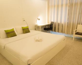 Chiangrai Clock Tower Hostel - צ'אנג ראי - חדר שינה