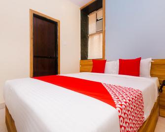 Hotel O Suncity - Mumbai - Bedroom