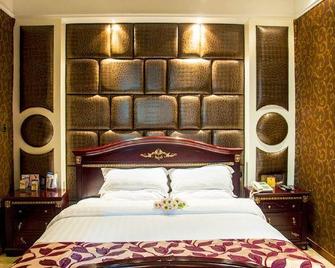 Guozhou Hotel - Nanchong - Schlafzimmer