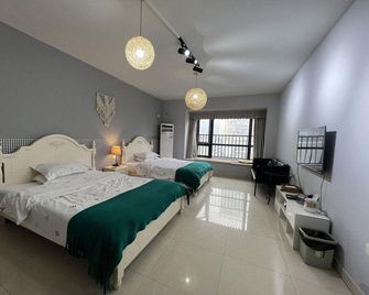 Duomi Apartment Hotel (Chongqing Guanyinqiao Beibin Road) - Chongqing - Bedroom