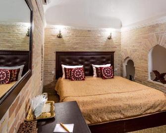 Hotel Orient Star - Khiva - Bedroom