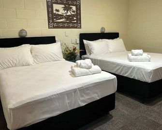 صن رايز ريزورت - نوكوالوفا - غرفة نوم