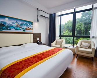 Nanyang Fengqing Business Hotel - Qionghai - Bedroom