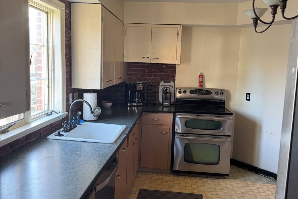All one floor Charming large2 bedroom, LR, sunrm, kitchen, 1 Full & 1 half bath