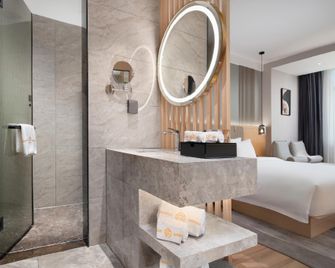 Liqi·Yu Hotel (Yuzhou Nadazhen Summer Plaza) - Danzhou - Habitación