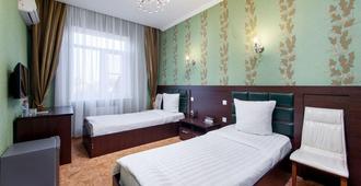 Vision Hotel - Krasnodar - Schlafzimmer