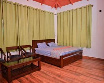 Nandi Cottage - Somvārpet - Bedroom