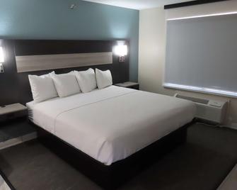 Best Western Prime Inn & Suites - Poteau - Schlafzimmer
