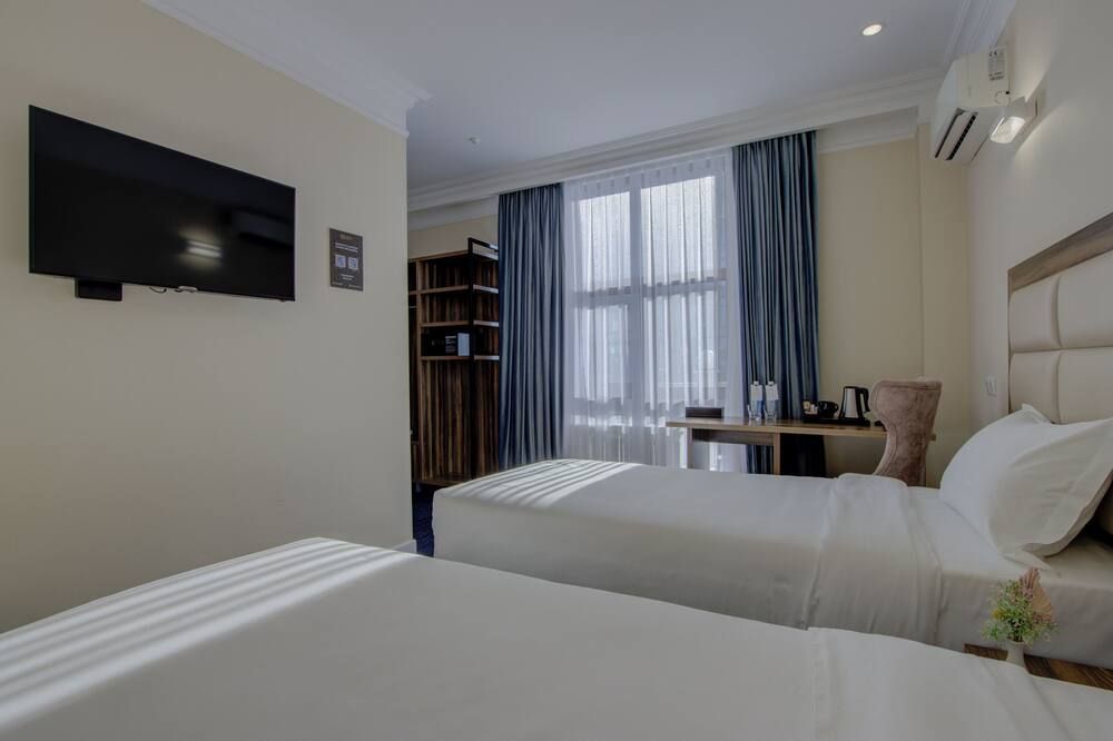 ريزيدنت هوتل بيشكيك - بيشكيك - غرفة نوم