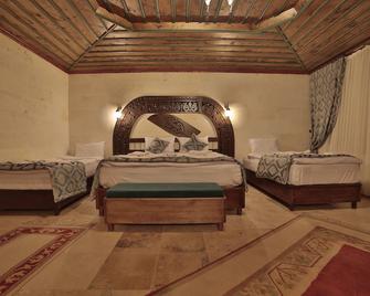 Grand Cappadocia Hotel - נבשאיר - חדר שינה