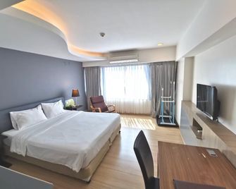 Grand Tower Inn Sathorn Hotel - Bangkok - Habitación