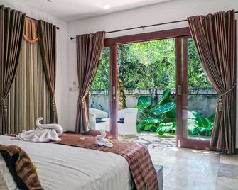 Villa Collard - Senggigi - Makuuhuone