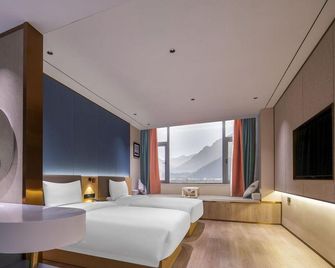 Elong Anyue Hotel (Nyingchi Xueyu Jiangnan Niyanghe Scenic Area) - Ньїнгчі - Спальня