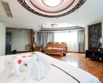 Hairun Hotel - Zaozhuang - Camera da letto