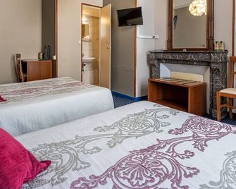 Logis Hôtel Central - Montargis - Slaapkamer