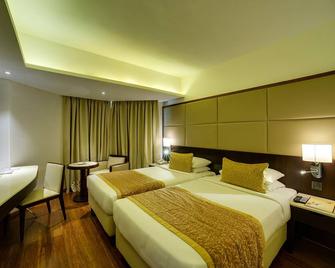 رامي جيست لاين هوتل جوهو - مومباي - غرفة نوم