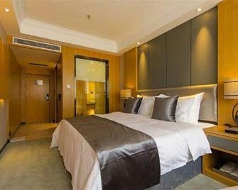 Xinya International Hotel - Женжоу - Спальня