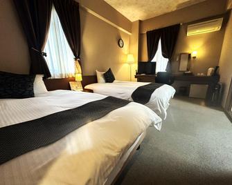 Royal Garden Hotel - Anan - Habitación