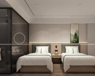 GreenTree Inn Huaibei Suixi county Sandikou Business Hotel - Huaibei - Habitación