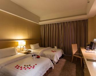 Jinjiang Metropolo Hotel - Langfang Wanda Plaza - Langfang - Спальня
