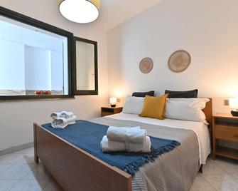 Izzhome Central Cozy - Pula - Bedroom