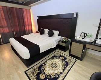 Al Hussam Hotel Apartments - Al Koude - Habitación