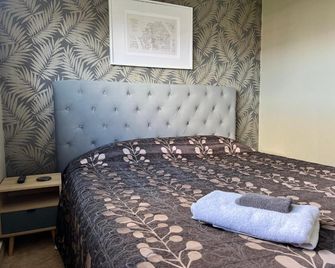 Asure Surrey Court Motel Invercargill - Invercargill - Bedroom