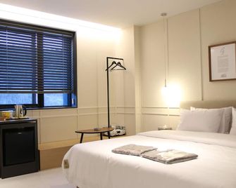 Changwon Brown Dot Hotel Palyong - Changwon - Slaapkamer