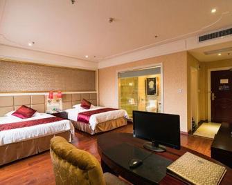 Canghai Qingya Hotel (Wuzhou High-Speed Rail South Station) - Wuzhou - Habitación