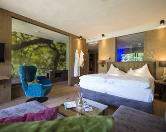 جارتنهوتل موزر - Eppan an der Weinstrasse - غرفة نوم