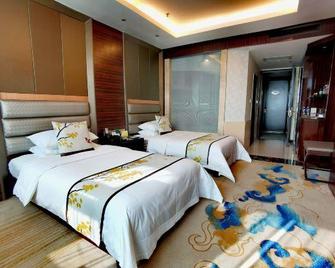 Shizilou Hotel - Liaocheng - Bedroom