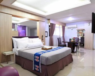 C'One Pulomas Hotel - Yakarta - Habitación