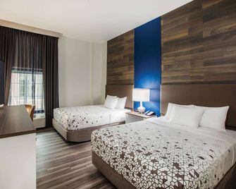 La Quinta Inn & Suites by Wyndham Owasso - Owasso - Schlafzimmer