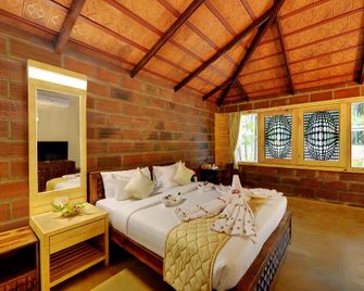 Gold Coins Club & Resort - באנגאלור - חדר שינה