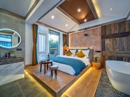 Lijiang Carnation inn - ליז'יאנג - חדר שינה