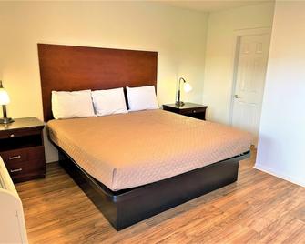 Budget Inn Giddings by Mukhi Hotels - Giddings - Bedroom