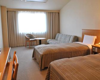 Hotel Folkloro Hanamakitowa - Hanamaki - Schlafzimmer