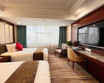 Skyline Plaza Hotel - غوانغزهو - غرفة نوم