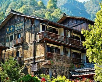 Xijiang Luanxi Hanshe Garden Hotel (No. 1 Fengyu Bridge Branch) - Qiandongnán - Edificio