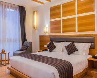 بيليانغ بوتيك - ثيمفو - غرفة نوم