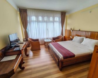 Pemaling Lords Inn Dirang - Dirāng - Habitación